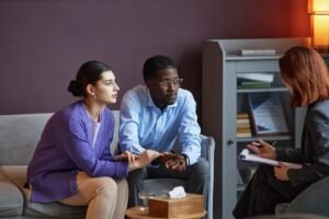 married couple visiting psychologist